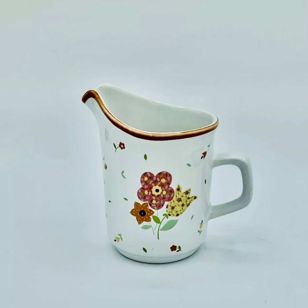 Calico Village Creamer Cup by David Davir